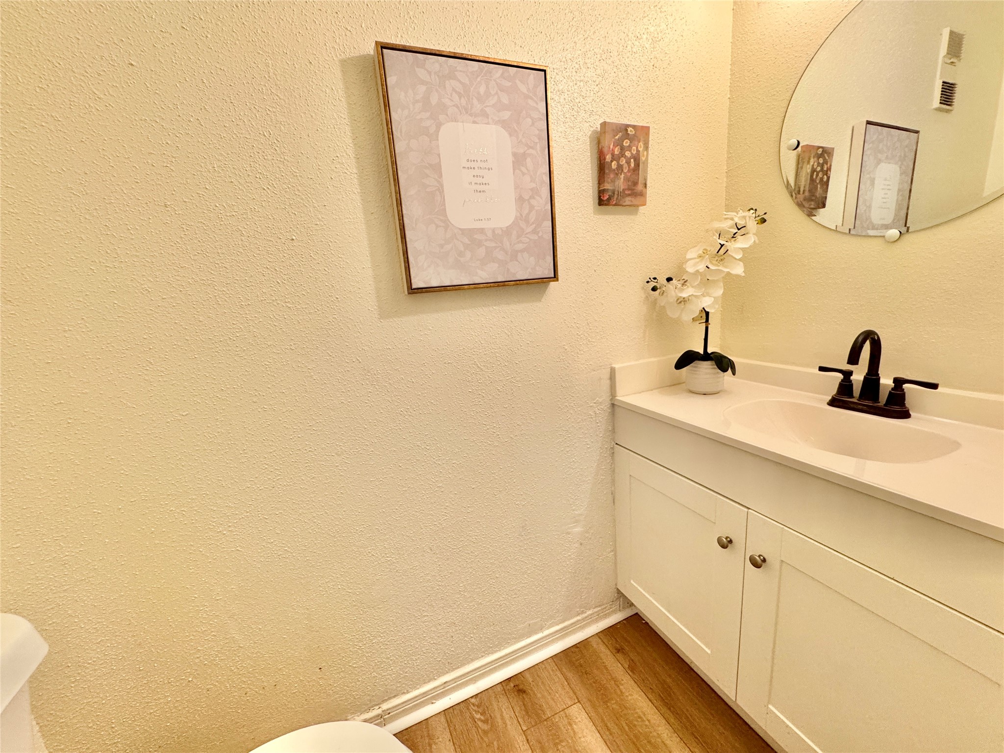 2002 Gentryside Drive, Unit 103 Houston, TX 77077 - Photo 8 of 20 Welcoming guest bathroom near the entry of the home on first level