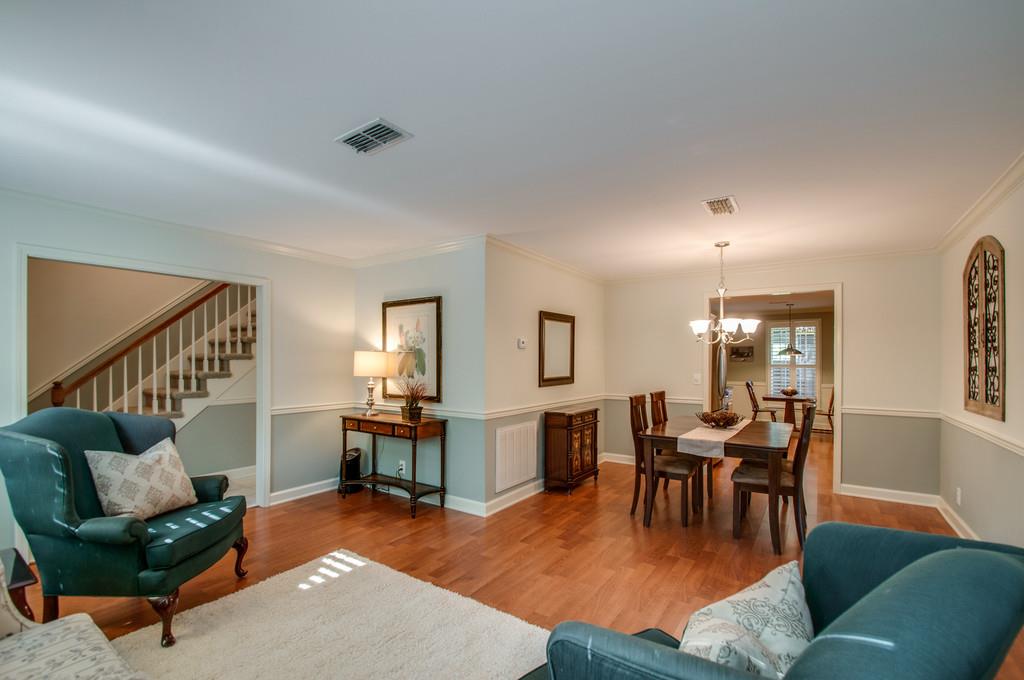 1086 General George Patton Road Nashville, TN 37221 - Photo 3 of 14 a living room with furniture and a wooden floor