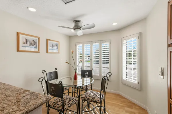 a view of a dining room with furniture