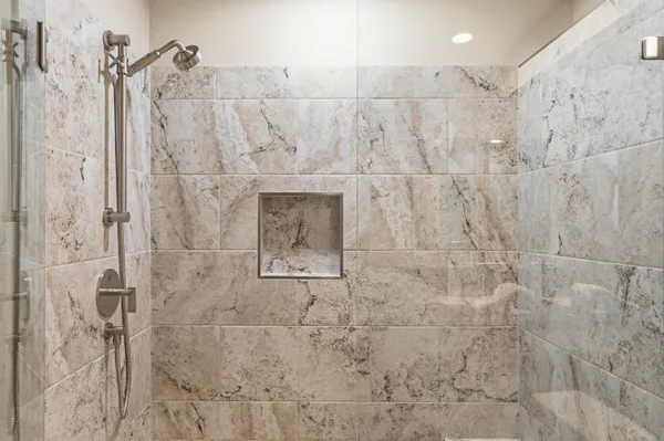 a view of a chair and tables in the terrace