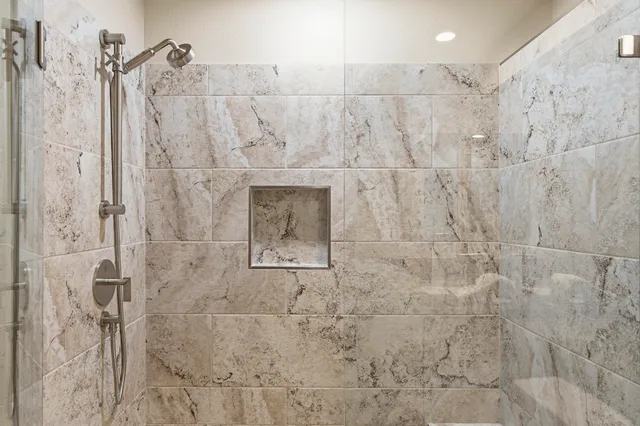 a view of a chair and tables in the terrace