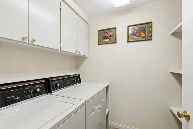 a view of a balcony with floor to ceiling windows