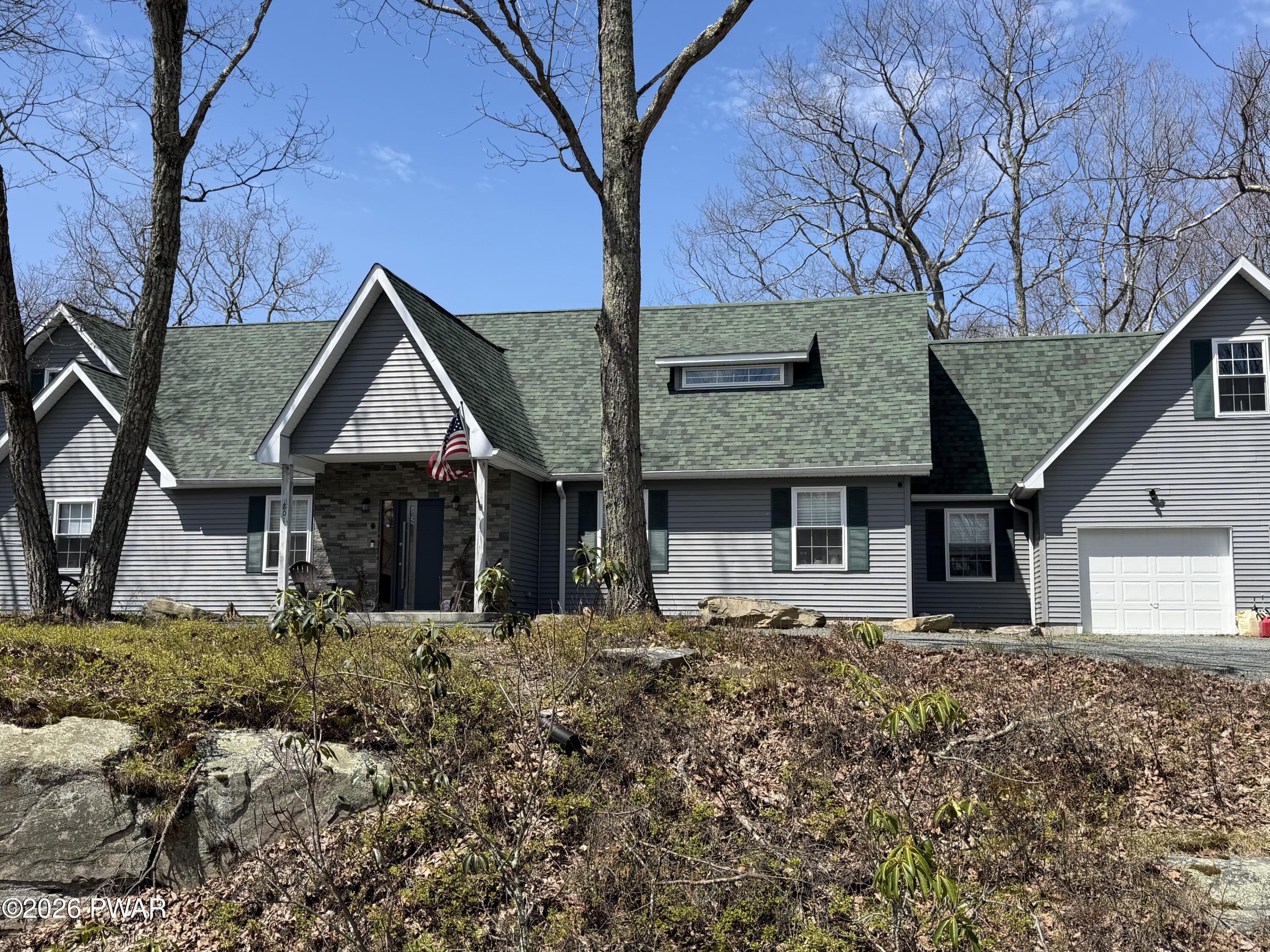 801 Maple Ridge Court Hawley, PA 18428 - Photo 1 of 55 front view of a house with a yard