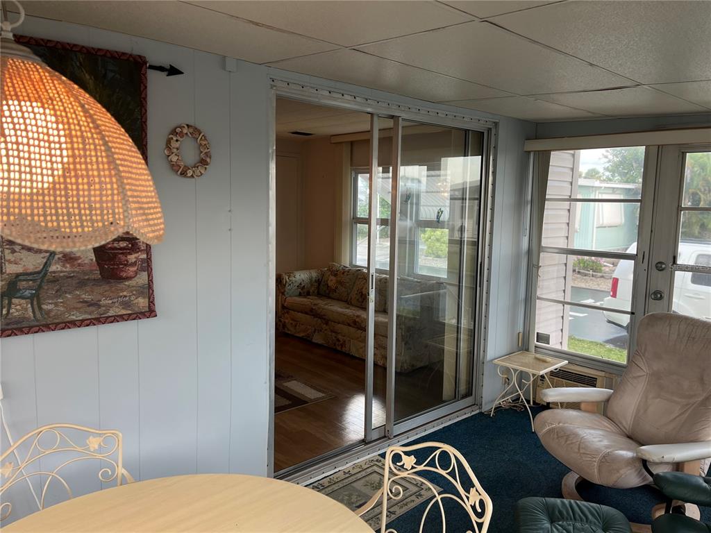 806 Jolanda Circle Venice, FL 34285 - Photo 17 of 44 a living room with furniture and a window