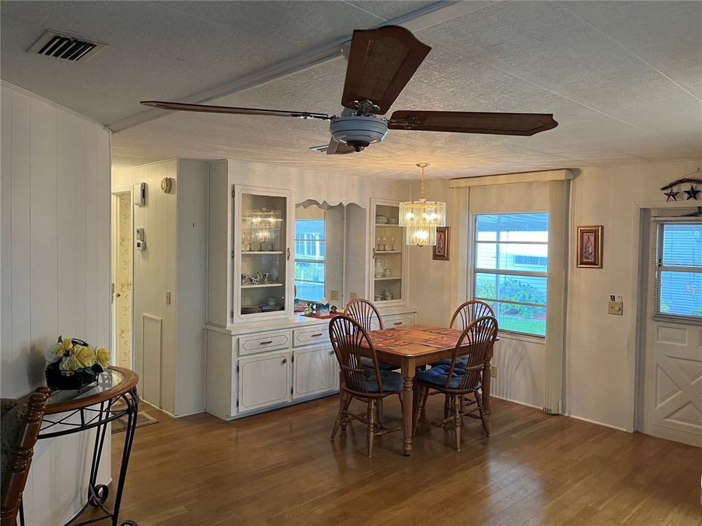 806 Jolanda Circle Venice, FL 34285 - Photo 18 of 44 a view of a dining room with furniture and chandelier