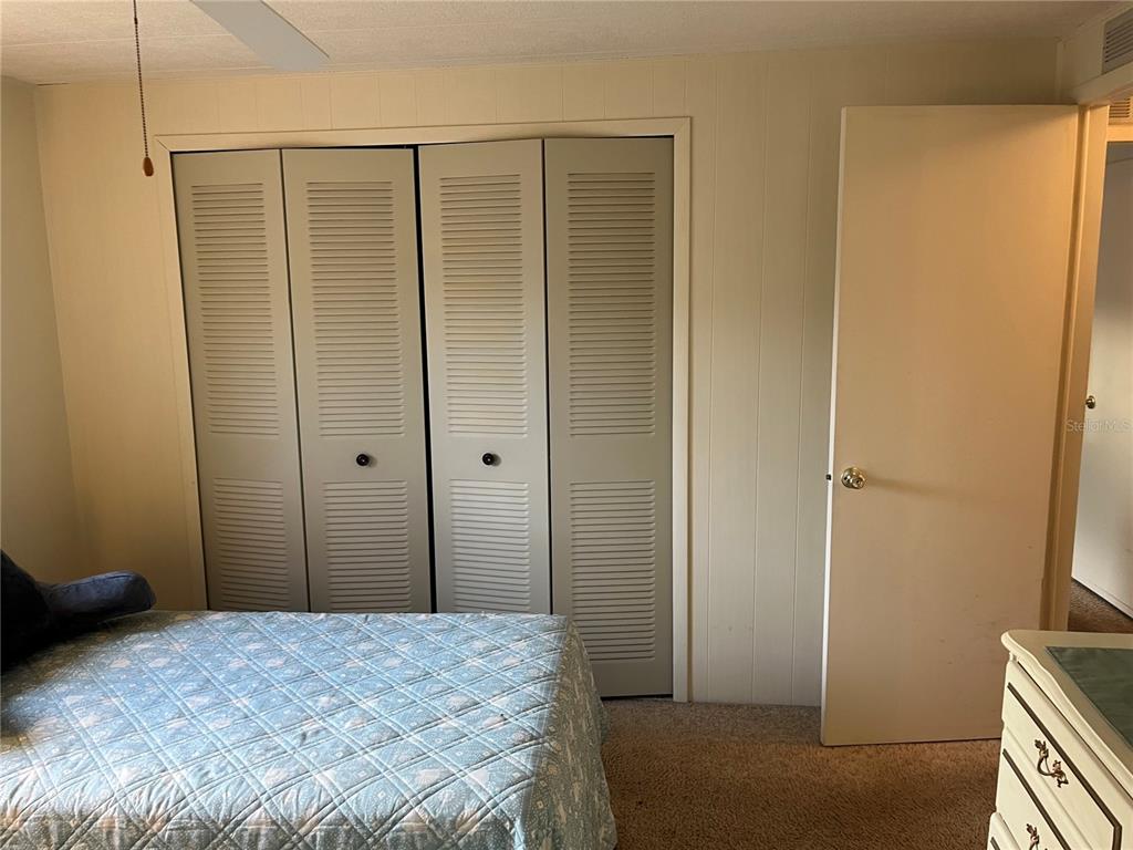 806 Jolanda Circle Venice, FL 34285 - Photo 29 of 44 a bedroom with a bed and a bathroom