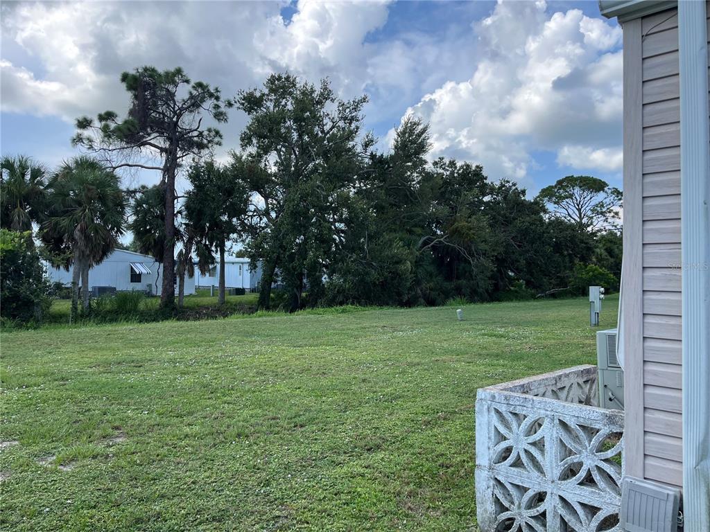 806 Jolanda Circle Venice, FL 34285 - Photo 4 of 44 a view of a backyard with garden