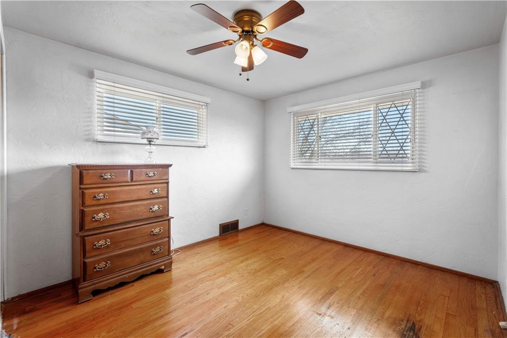 257 Robinhood Road Pittsburgh, PA 15220 - Photo 20 of 35 a view of a livingroom with a fan & a window