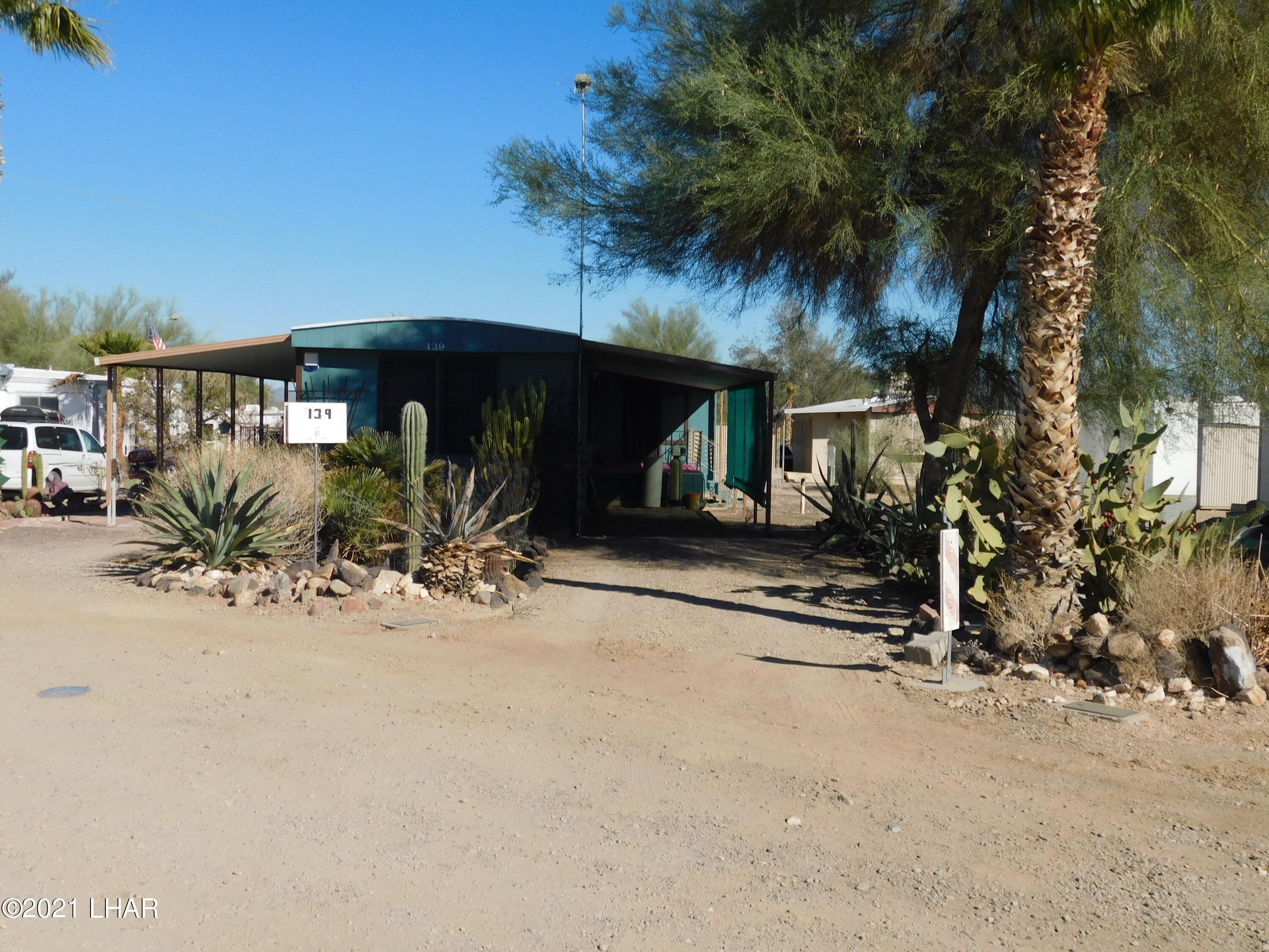 1240 Acacia Road, Unit 139 Quartzsite, AZ 85346 - Photo 2 of 37 Single wide with carport and deck patio