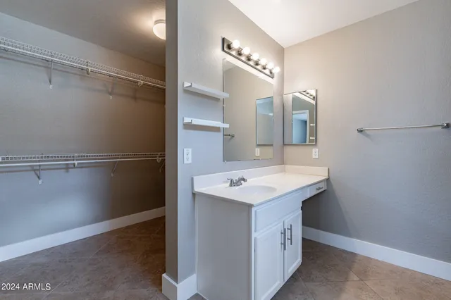a utility room with cabinets