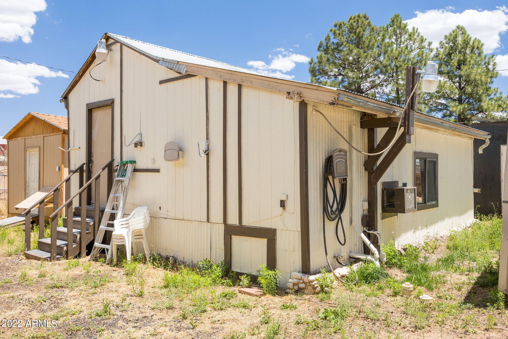 2053 Lumber Valley Road Overgaard, AZ 85933 - Photo 14 of 23 web_2053LumberValleyRd-Exterior-SHightow