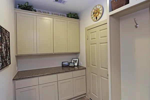 a bedroom with bed and window