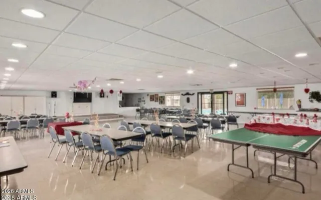 a view of a workspace with furniture