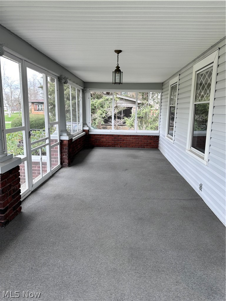 910 Cambridge Road Coshocton, OH 43812 - Photo 25 of 30 View of unfurnished sunroom
