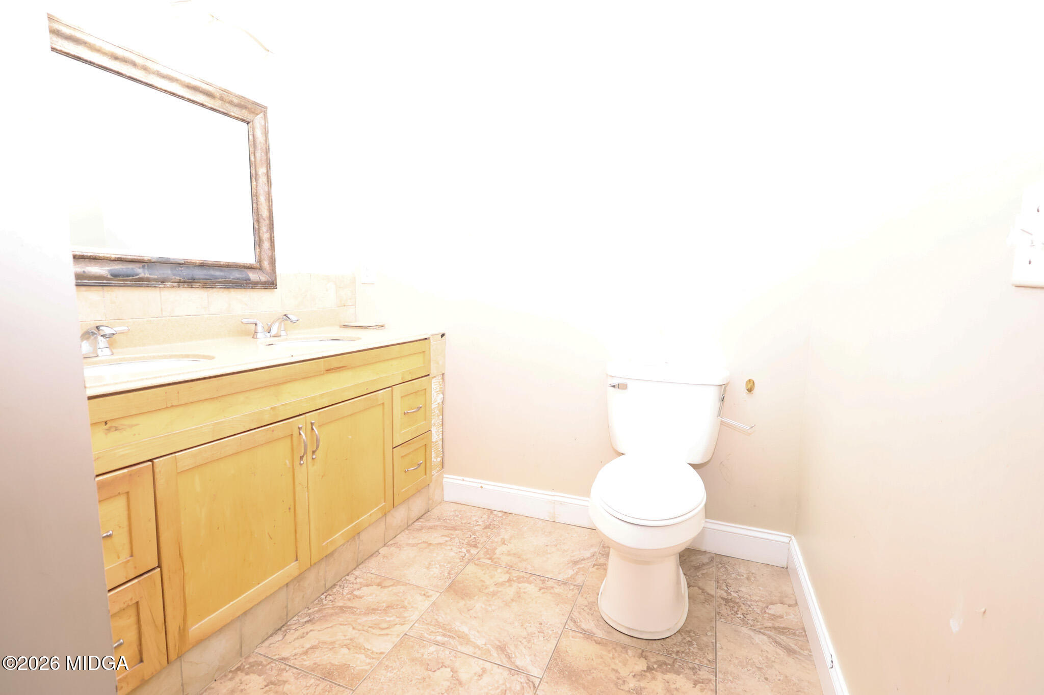 1025 Feagin Mill Road Warner Robins, GA 31088 - Photo 12 of 28 a bathroom with a sink and a toilet
