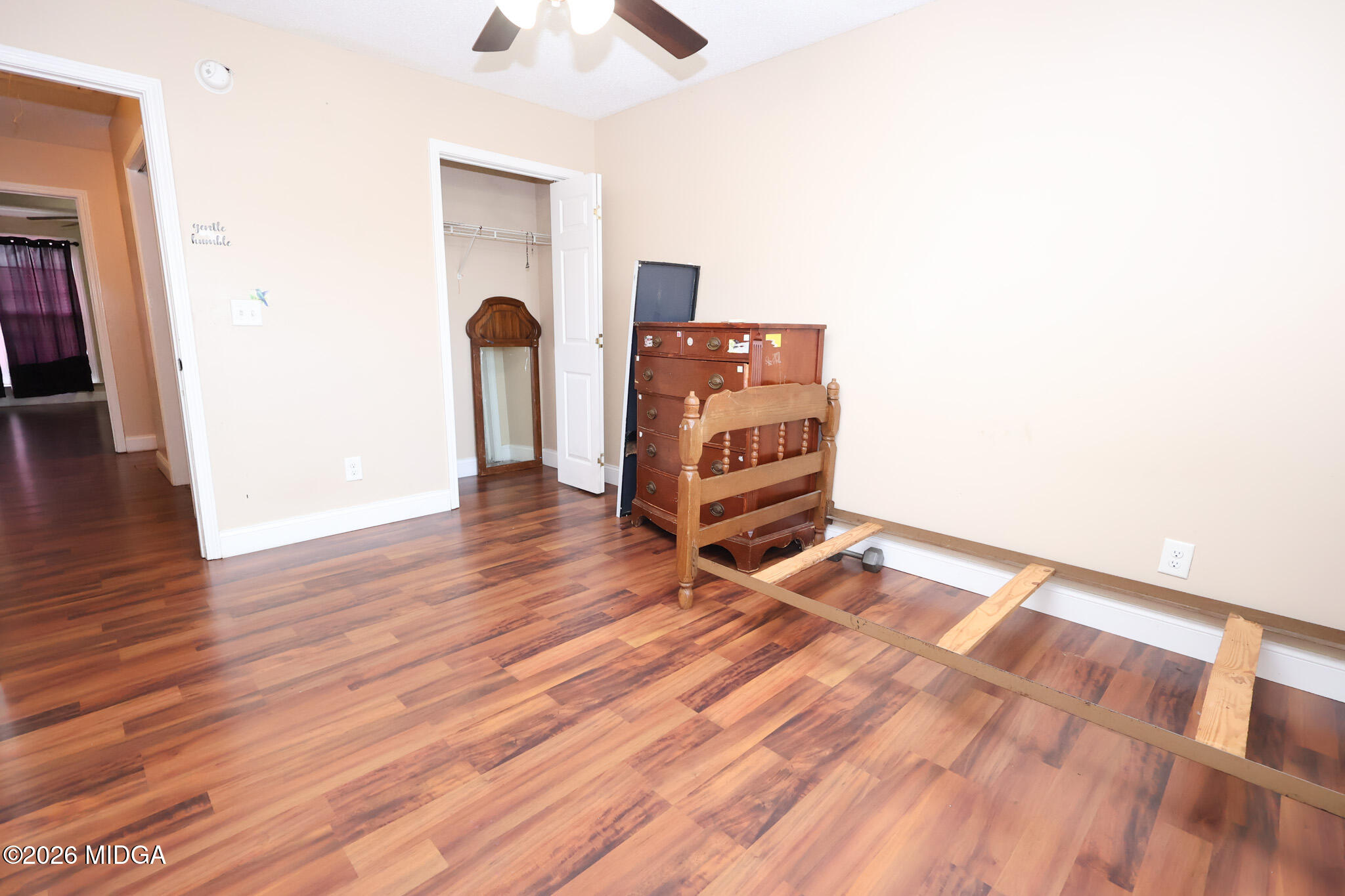1025 Feagin Mill Road Warner Robins, GA 31088 - Photo 16 of 28 an empty room with wooden floor and closet
