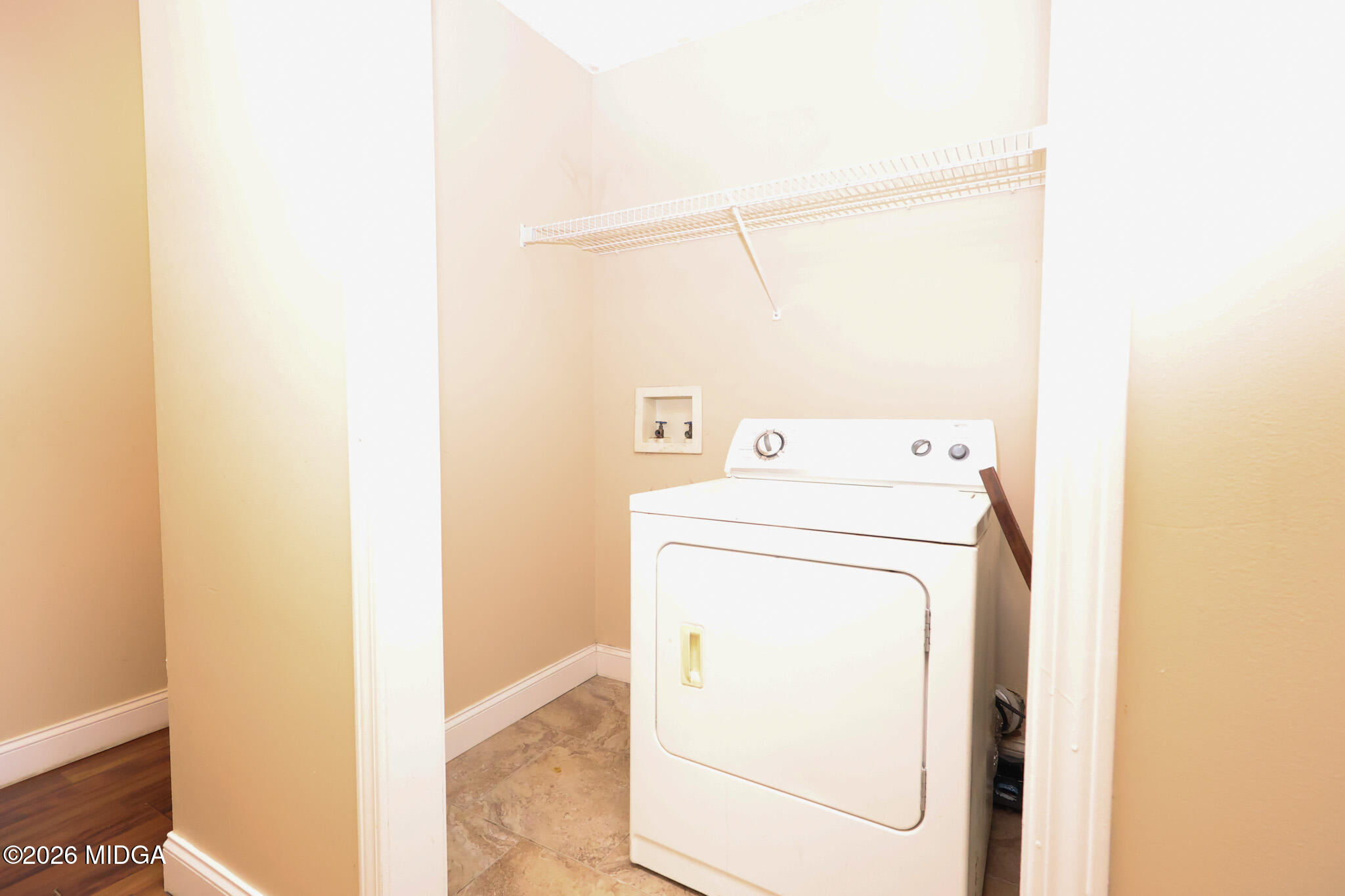 1025 Feagin Mill Road Warner Robins, GA 31088 - Photo 18 of 28 a utility room with dryer and washer