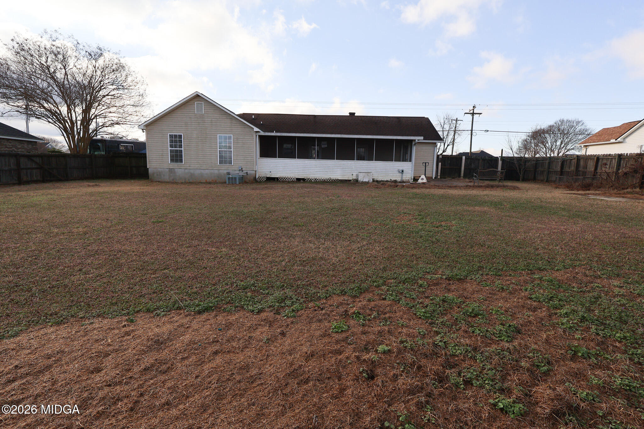 1025 Feagin Mill Road Warner Robins, GA 31088 - Photo 25 of 28 a view of a house with a yard