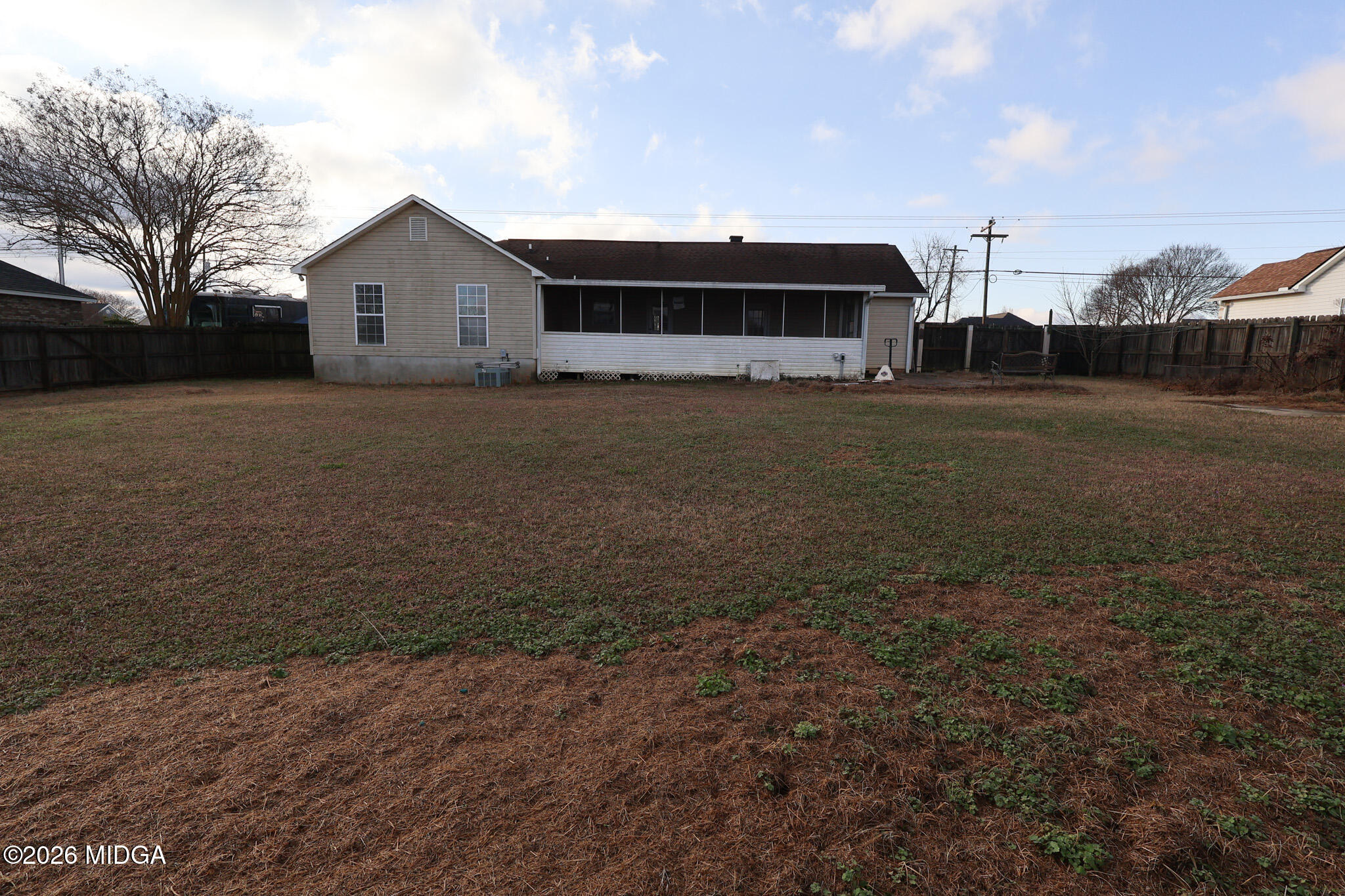 1025 Feagin Mill Road Warner Robins, GA 31088 - Photo 26 of 28 a view of a house with a yard