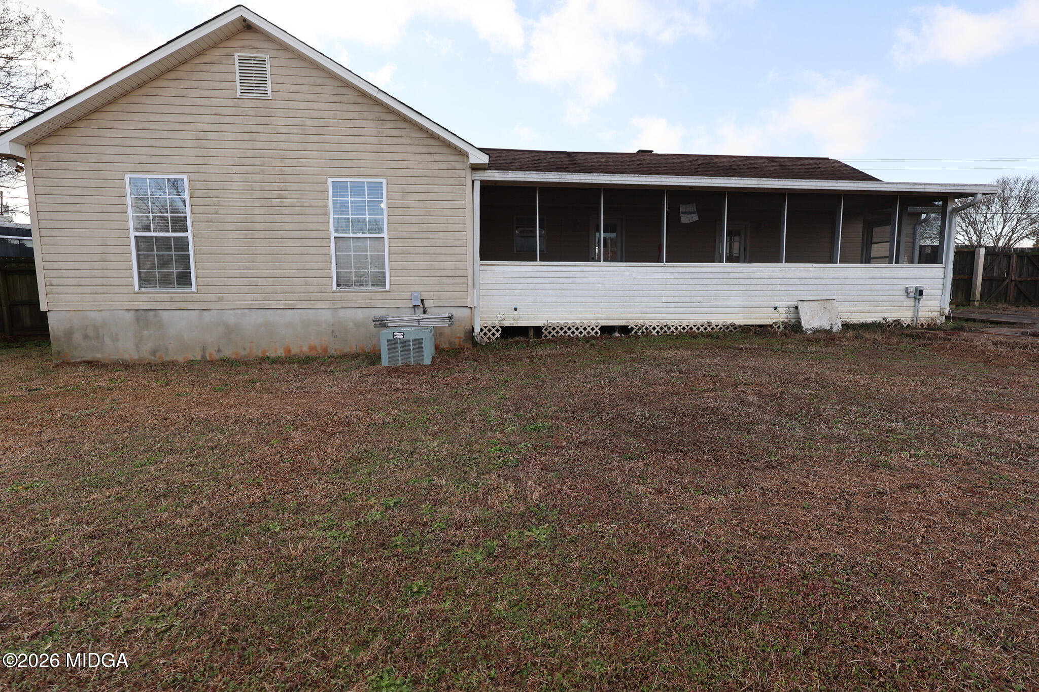 1025 Feagin Mill Road Warner Robins, GA 31088 - Photo 28 of 28 a front view of a house with a large tree