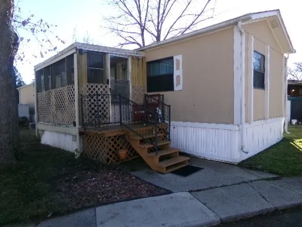 a view of a porch with furniture