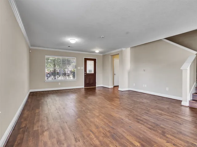 a kitchen with granite countertop stainless steel appliances and wooden cabinets
