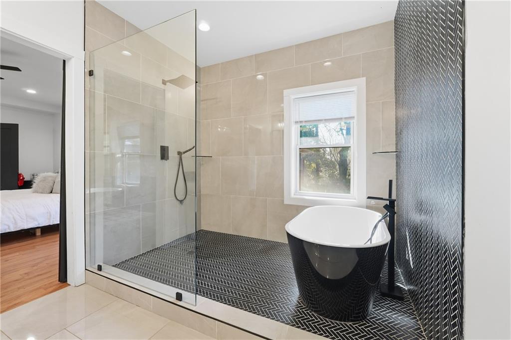 1973 Glendale Drive Decatur, GA 30032 - Photo 19 of 28 a bathroom with a sink toilet and shower