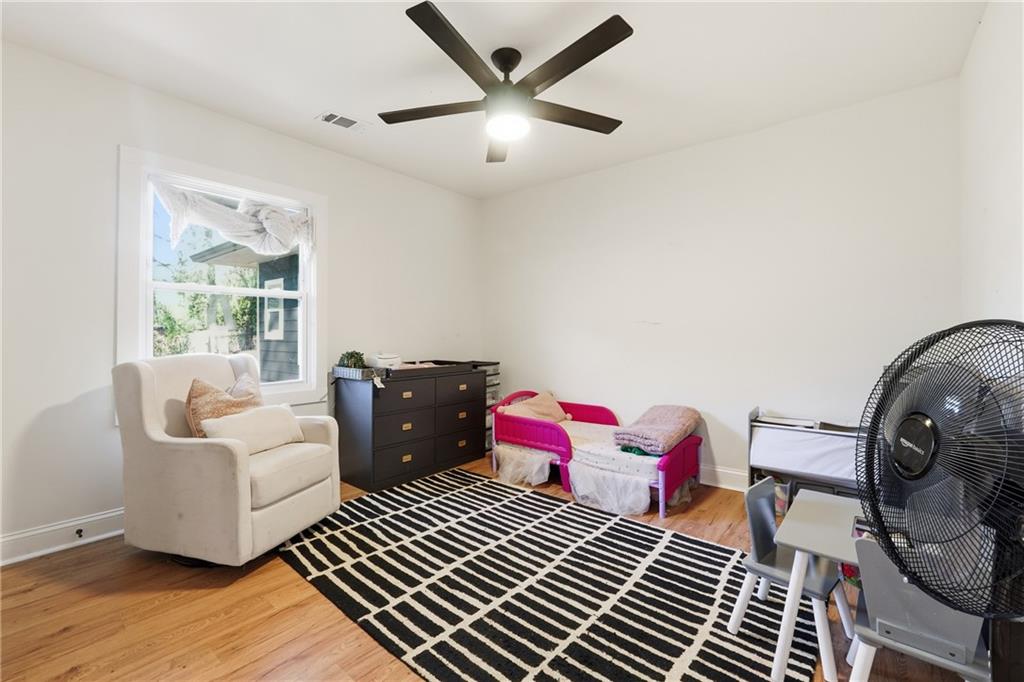 1973 Glendale Drive Decatur, GA 30032 - Photo 20 of 28 a living room with furniture and wooden floor