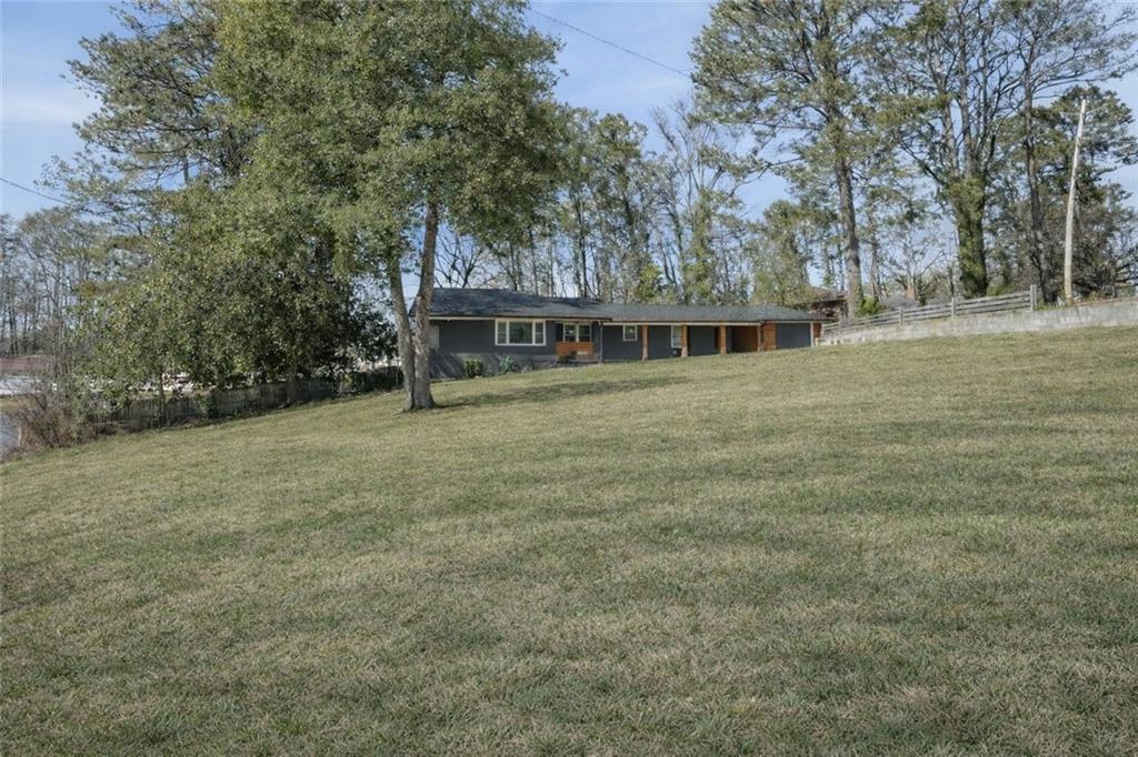 1973 Glendale Drive Decatur, GA 30032 - Photo 2 of 28 a view of a house with a yard