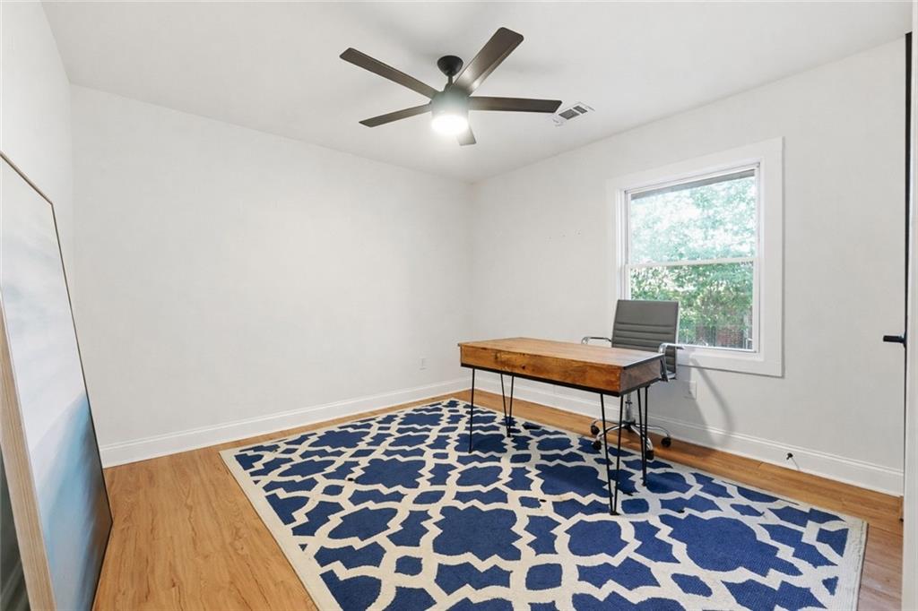 1973 Glendale Drive Decatur, GA 30032 - Photo 23 of 28 a bench sitting in a room next to a window