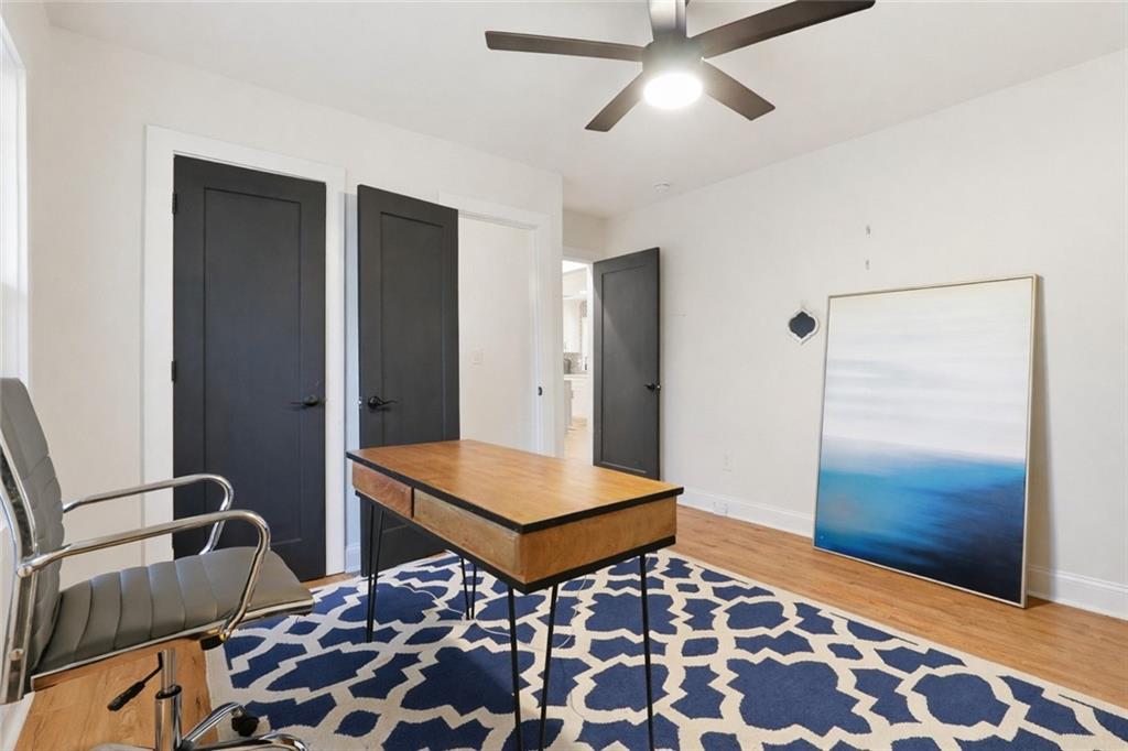 1973 Glendale Drive Decatur, GA 30032 - Photo 24 of 28 a living room with a rug and wooden floor