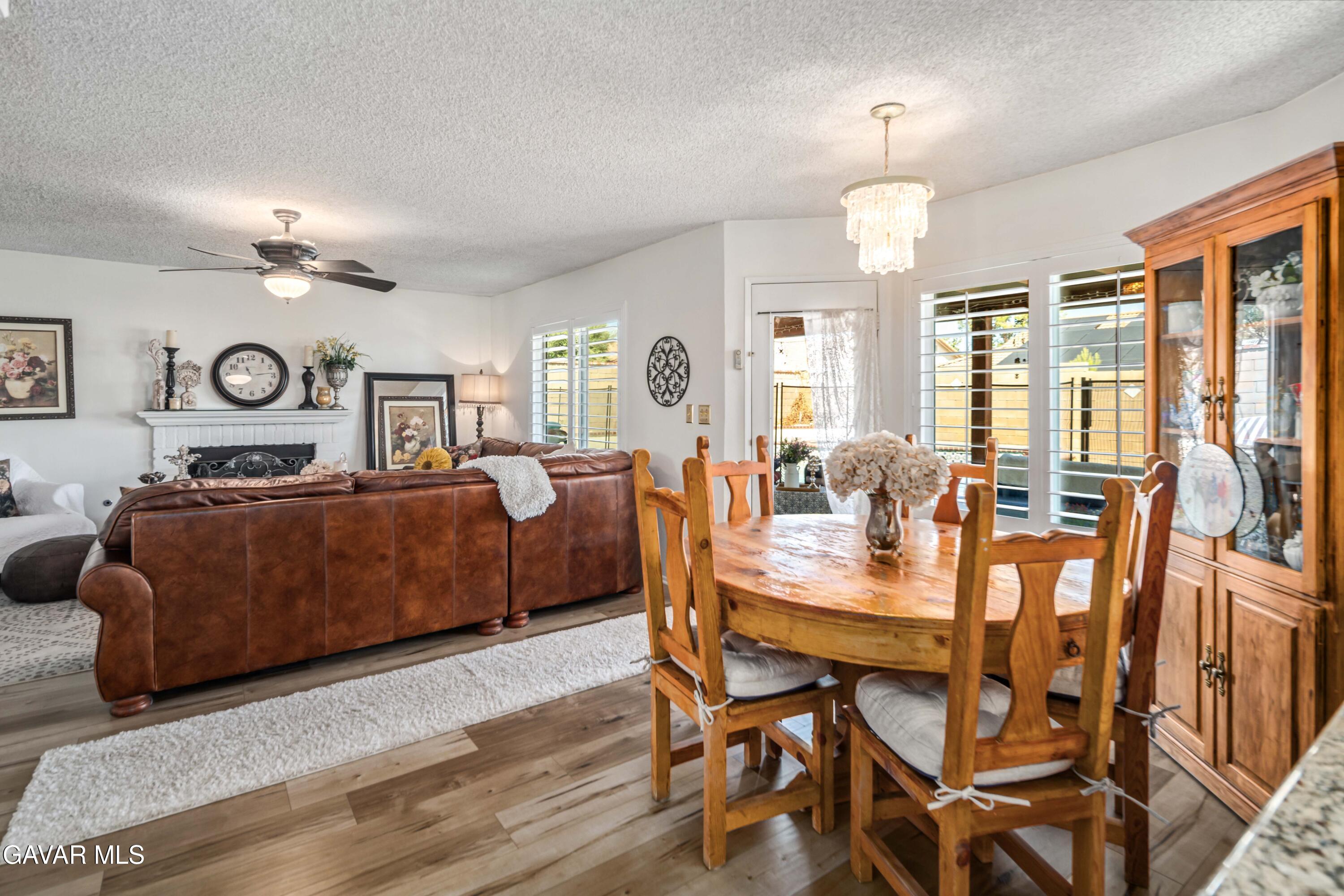 4535 Talento Way Palmdale, CA 93551 - Photo 13 of 43 a living room with furniture kitchen area and a window