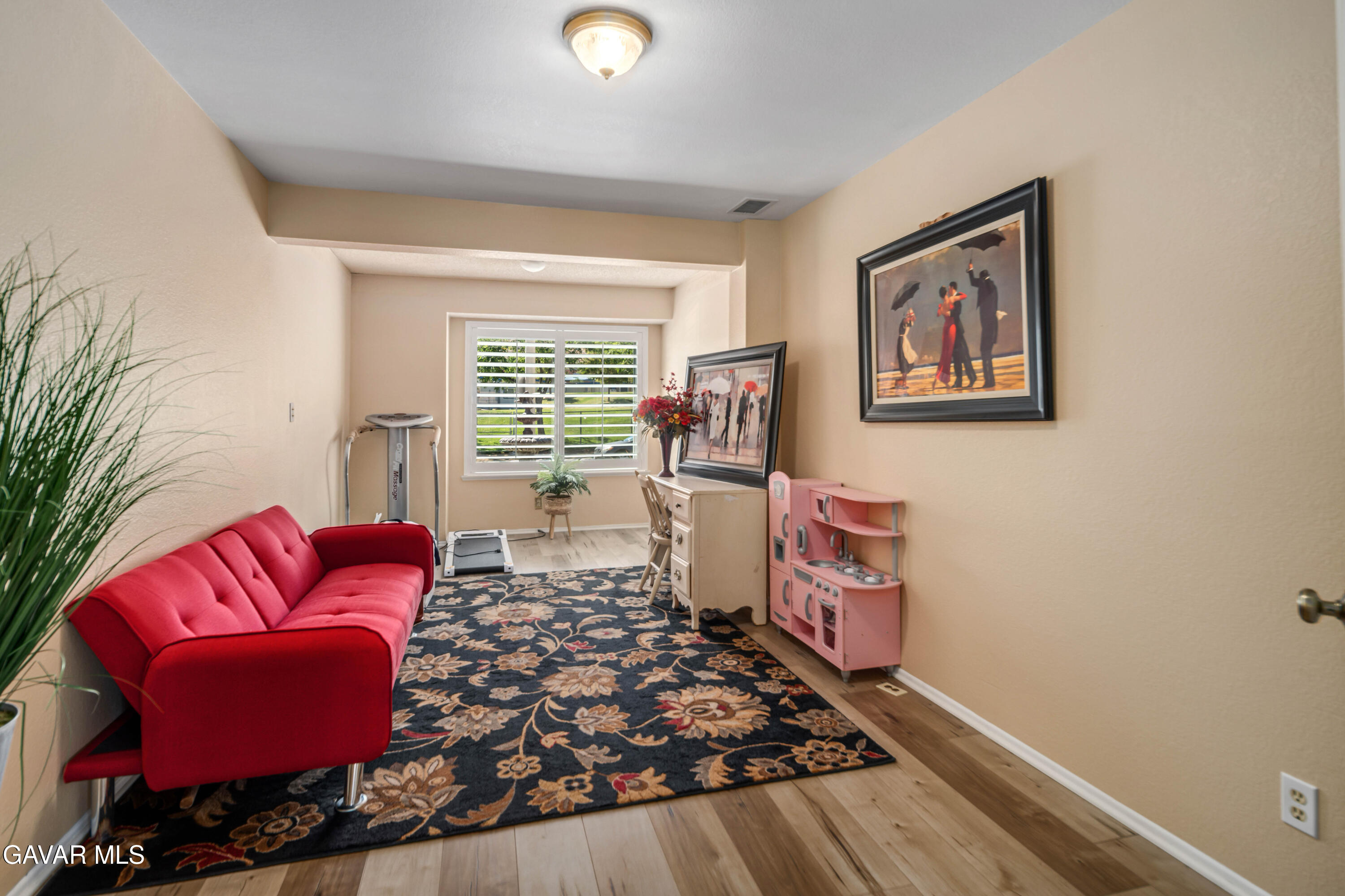 4535 Talento Way Palmdale, CA 93551 - Photo 17 of 43 a living room with furniture and a rug