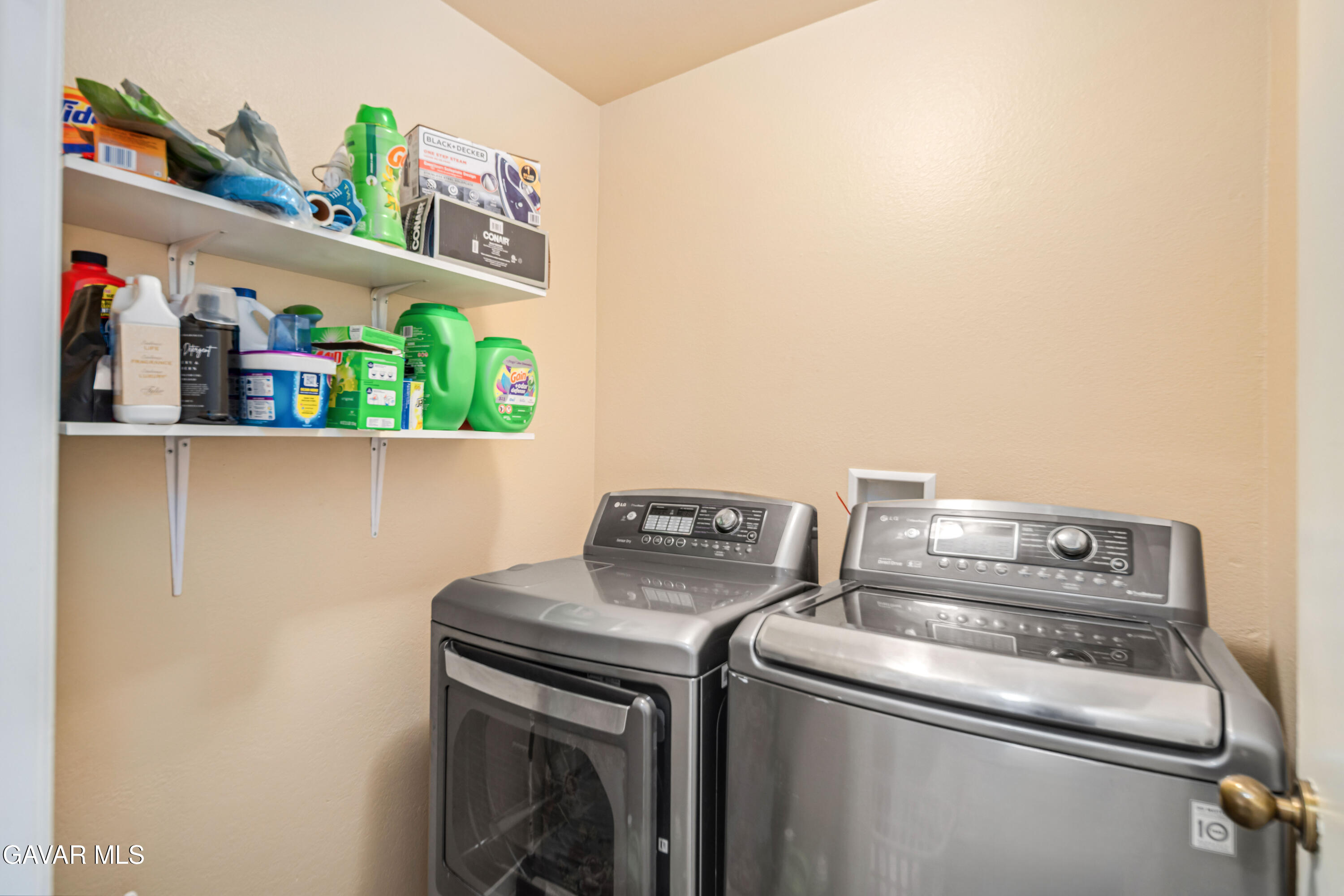 4535 Talento Way Palmdale, CA 93551 - Photo 30 of 43 a utility room with dryer and washer