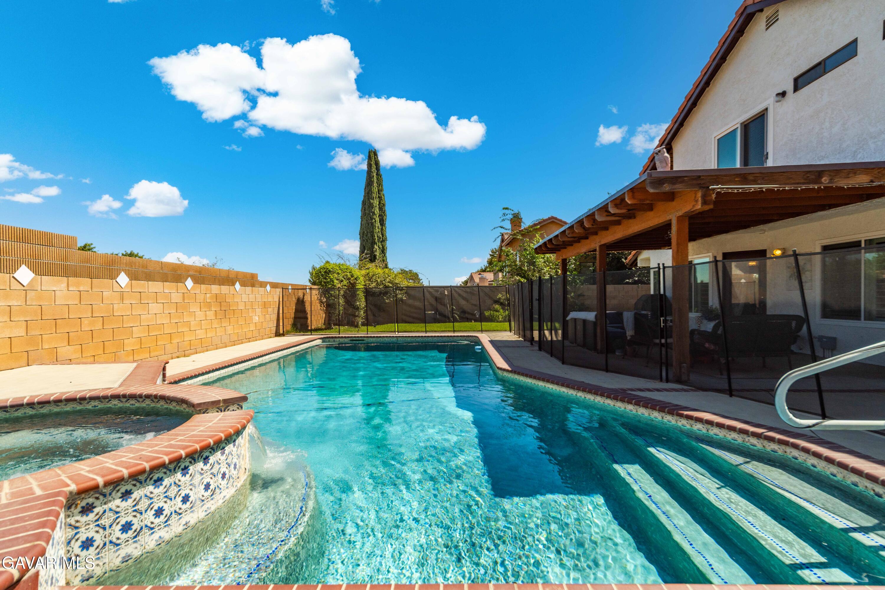 4535 Talento Way Palmdale, CA 93551 - Photo 39 of 43 a swimming pool view with a garden space