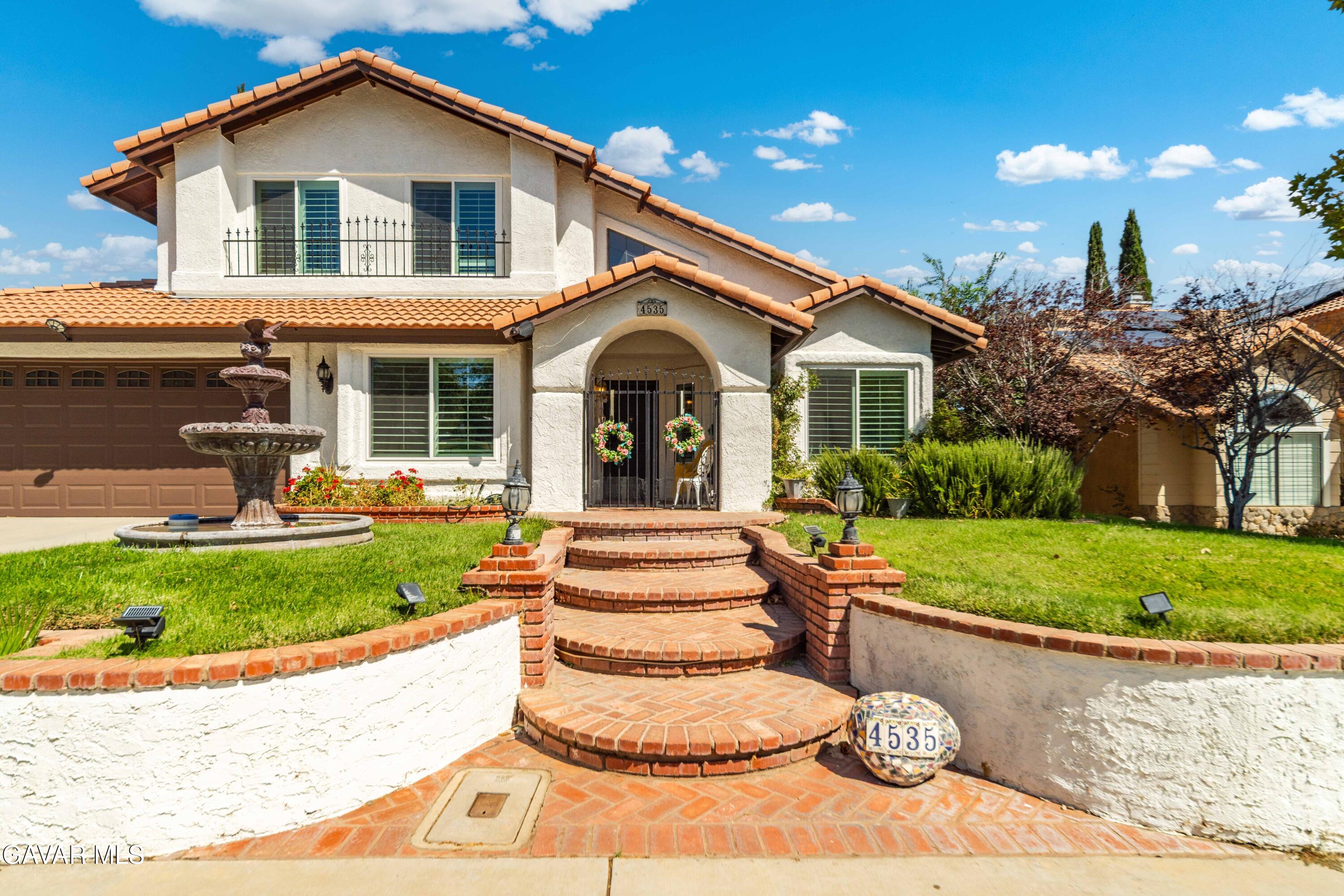 4535 Talento Way Palmdale, CA 93551 - Photo 4 of 43 a front view of a house with a yard