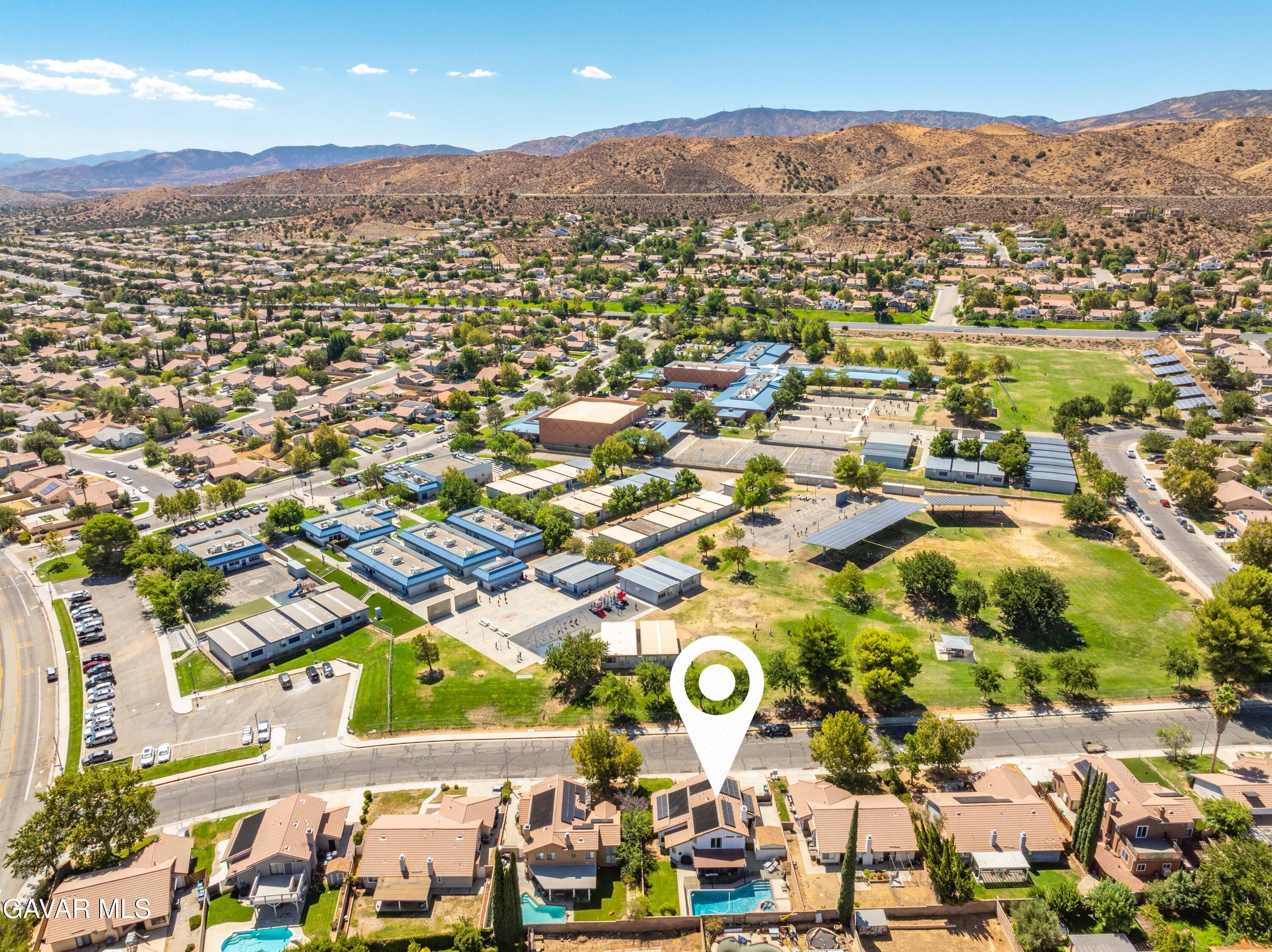 4535 Talento Way Palmdale, CA 93551 - Photo 41 of 43 an aerial view of residential building and parking space
