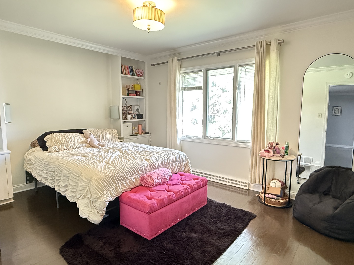 402 West Le Fevre Road Sterling, IL 61081 - Photo 23 of 39 a bedroom with a bed couch and window