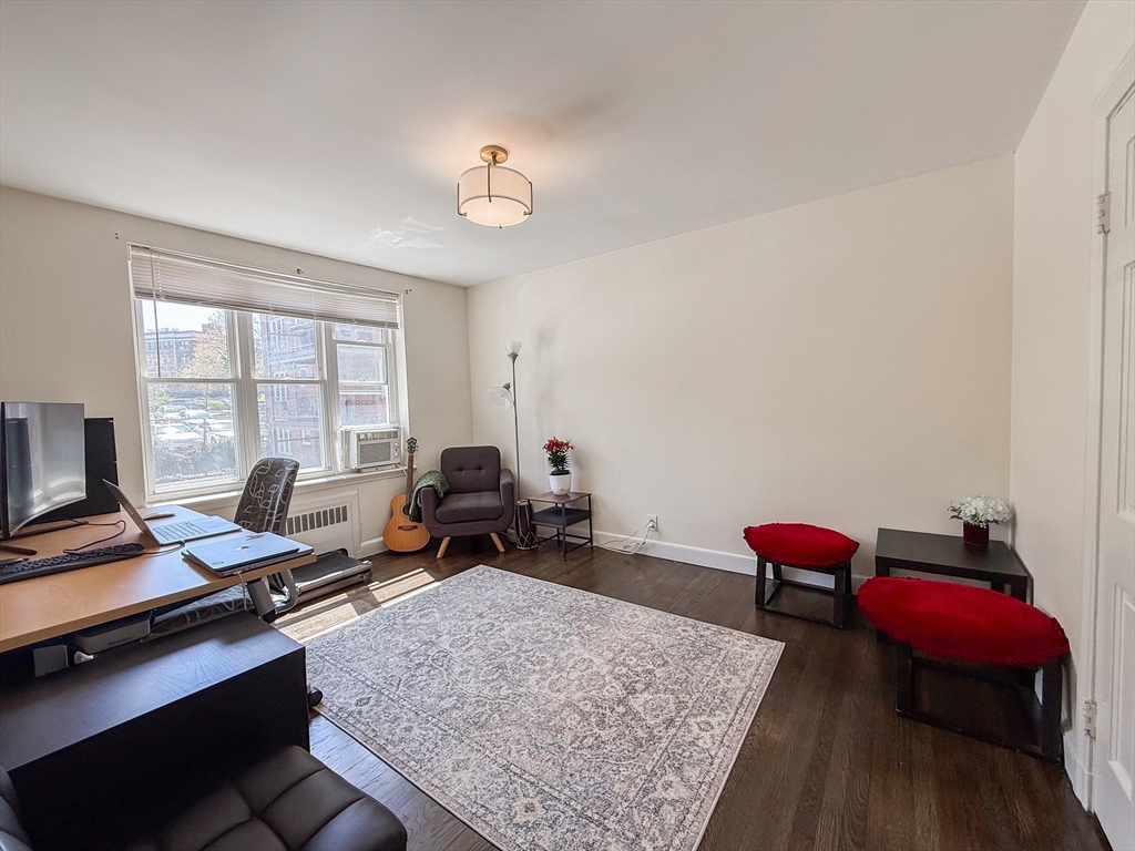 84 Strathmore Road, Unit 4 Boston, MA 02135 - Photo 12 of 14 a view of a workspace with furniture and a window