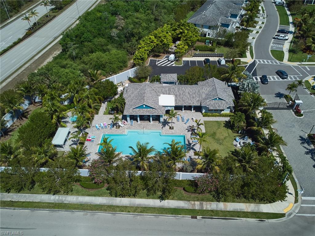 2664 Seychelles Circle, Unit 2402 Naples, FL 34112 - Photo 19 of 30 an aerial view of a house with garden space and street view