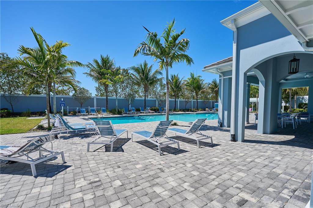 2664 Seychelles Circle, Unit 2402 Naples, FL 34112 - Photo 21 of 30 a view of a patio with a patio