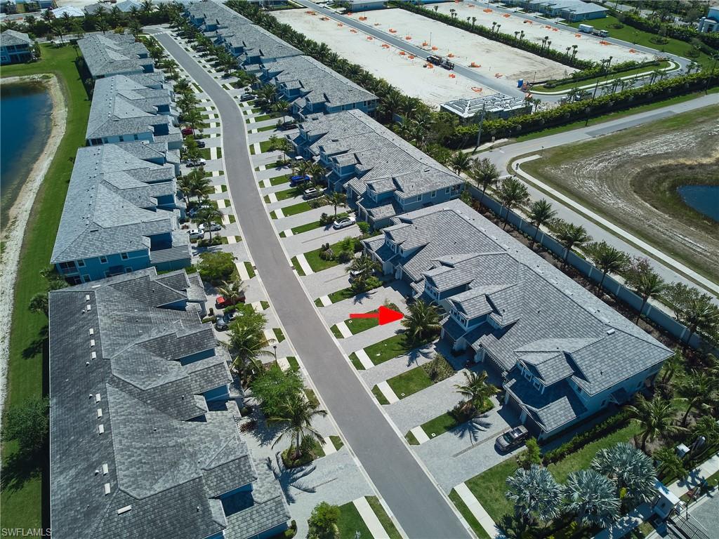 2664 Seychelles Circle, Unit 2402 Naples, FL 34112 - Photo 27 of 30 an aerial view of a house