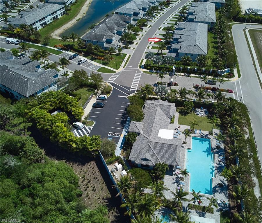 2664 Seychelles Circle, Unit 2402 Naples, FL 34112 - Photo 30 of 30 an aerial view of multiple houses with yard