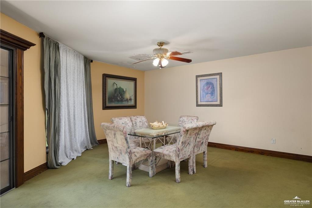 4523 South Tower Road Edinburg, TX 78542 - Photo 16 of 32 a dining room with furniture and window