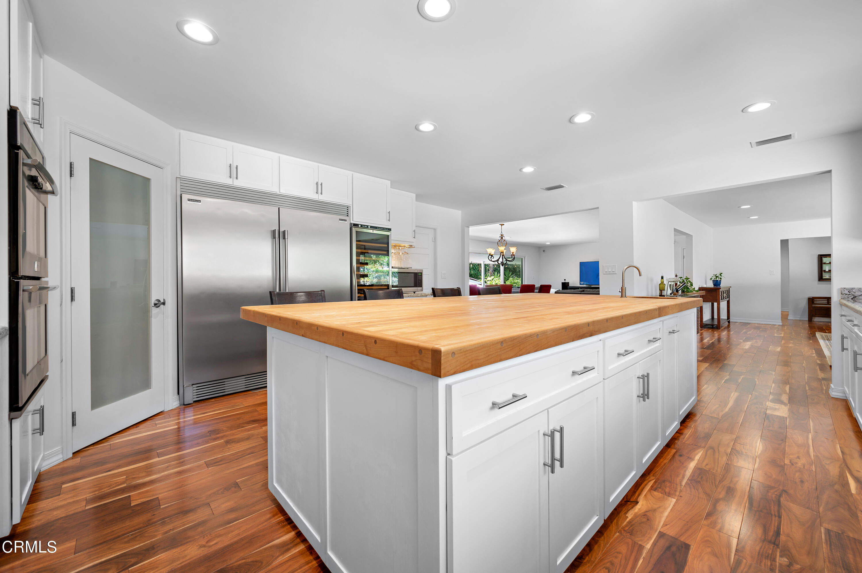 3770 Shadow Grove Road Pasadena, CA 91107 - Photo 17 of 61 a kitchen with stainless steel appliances kitchen island granite countertop a large counter top and sink