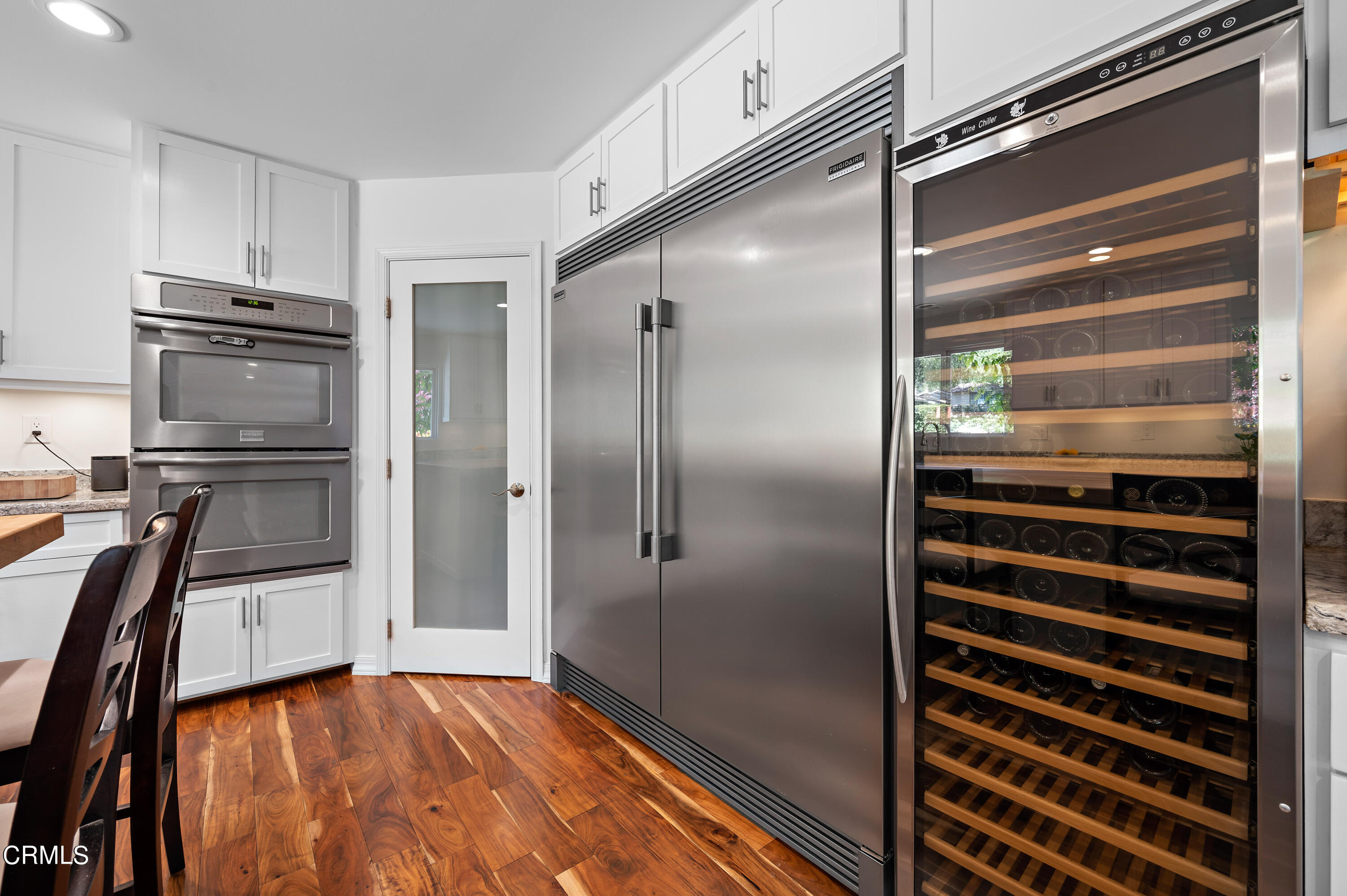 3770 Shadow Grove Road Pasadena, CA 91107 - Photo 18 of 61 a kitchen with stainless steel appliances a refrigerator and a stove top oven