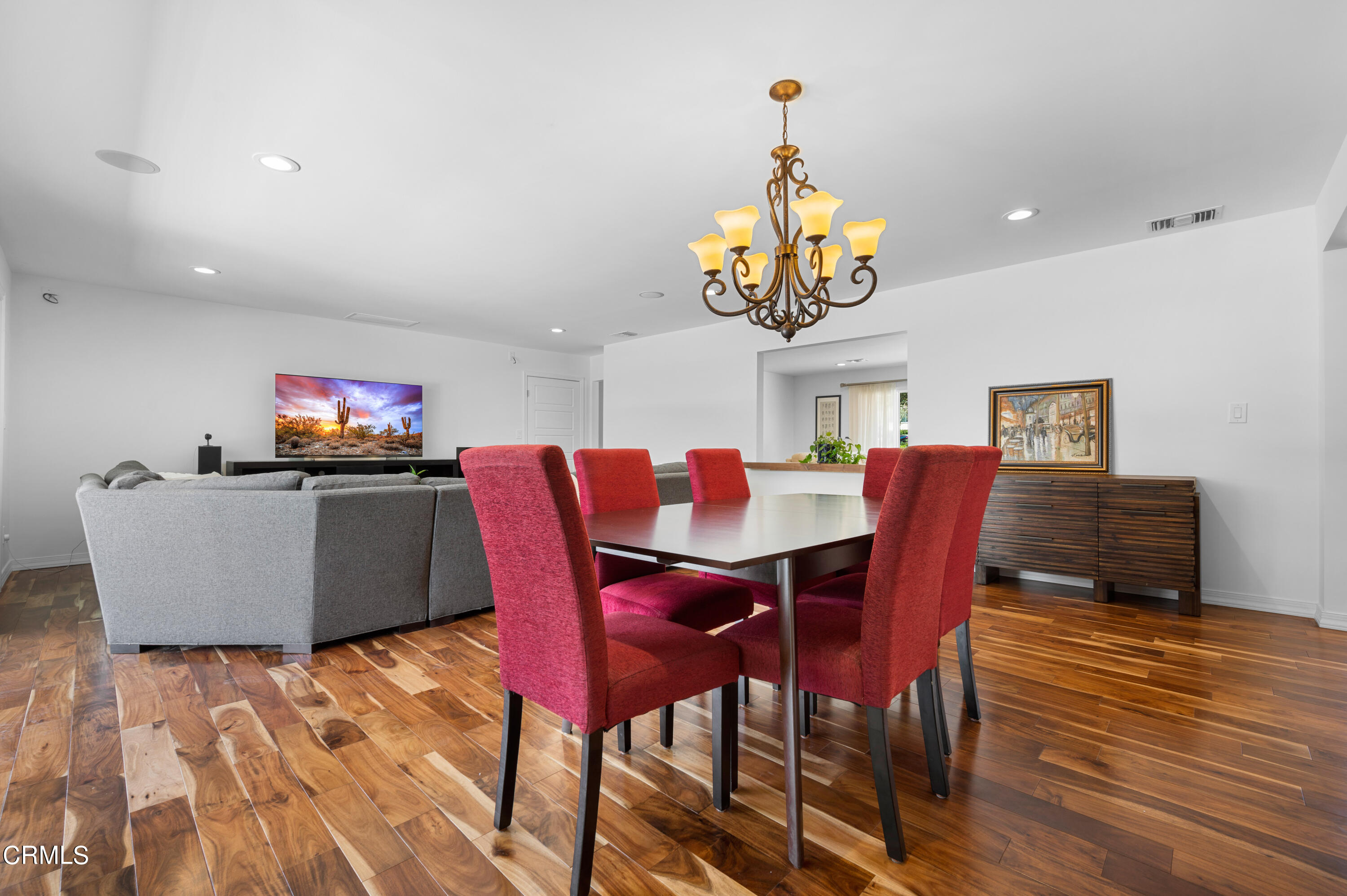 3770 Shadow Grove Road Pasadena, CA 91107 - Photo 21 of 61 a view of a dining room with furniture a chandelier and wooden floor