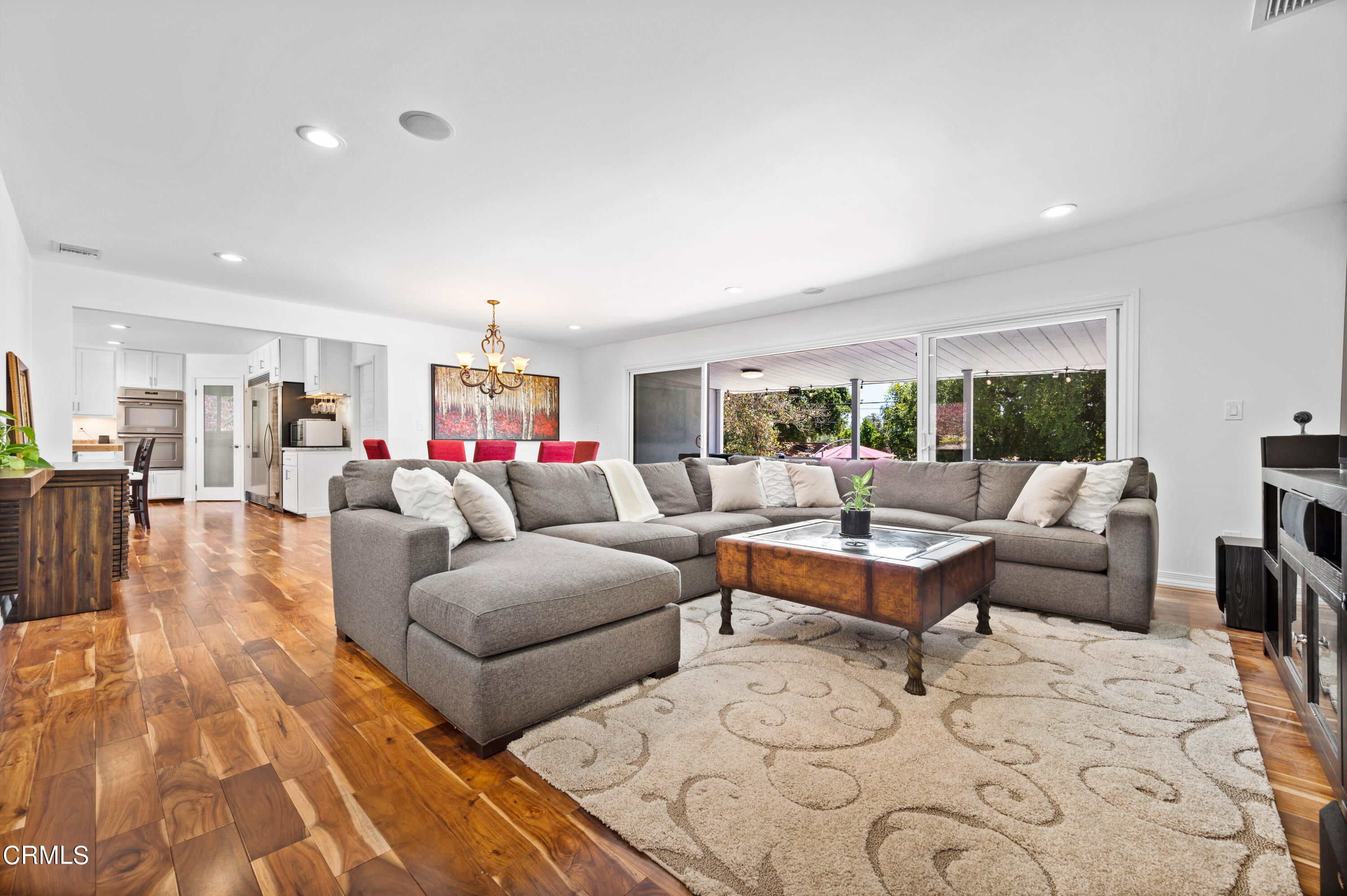 3770 Shadow Grove Road Pasadena, CA 91107 - Photo 22 of 61 a living room with furniture and a dining table with kitchen view