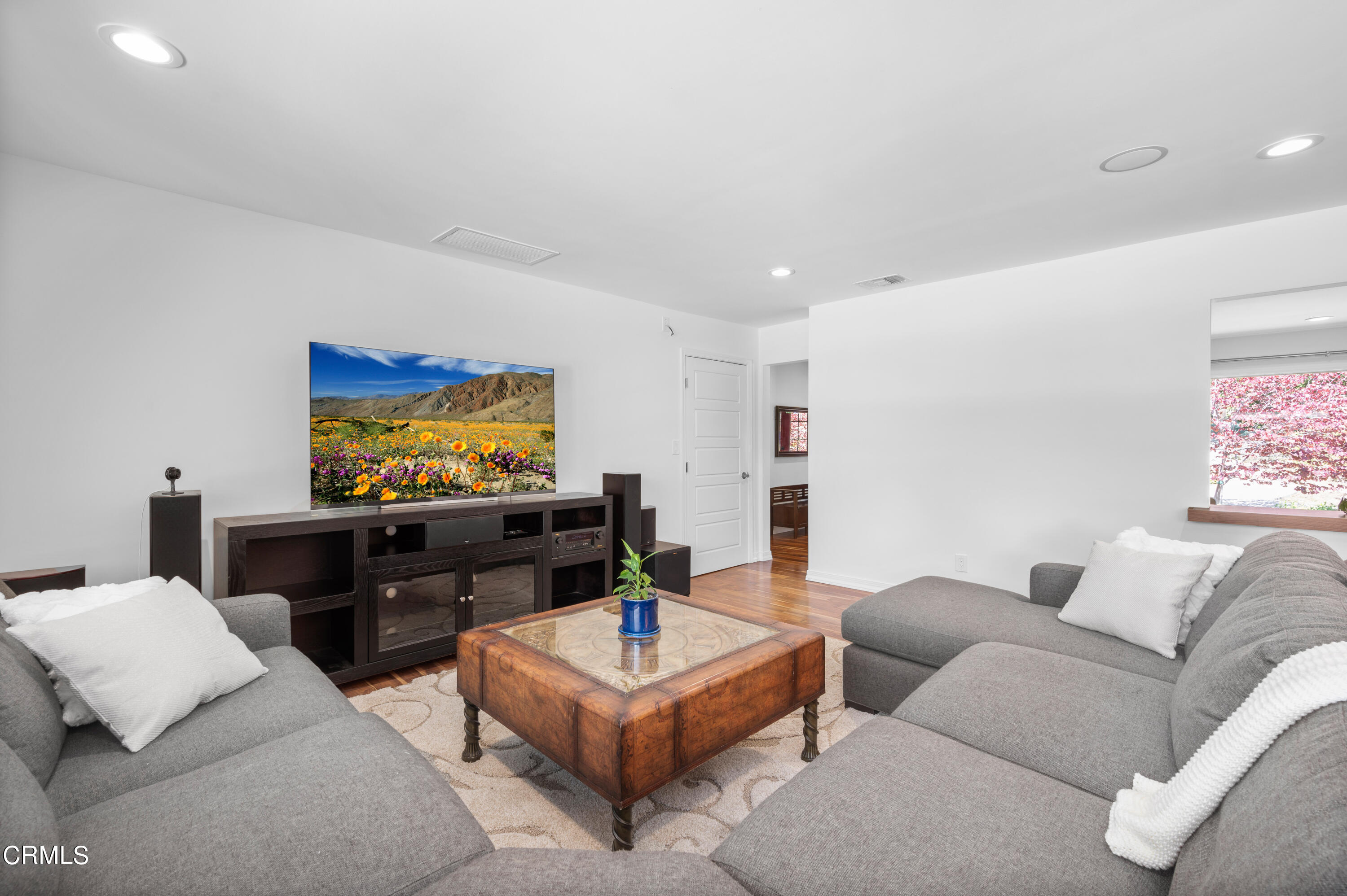 3770 Shadow Grove Road Pasadena, CA 91107 - Photo 23 of 61 a living room with furniture and a flat screen tv