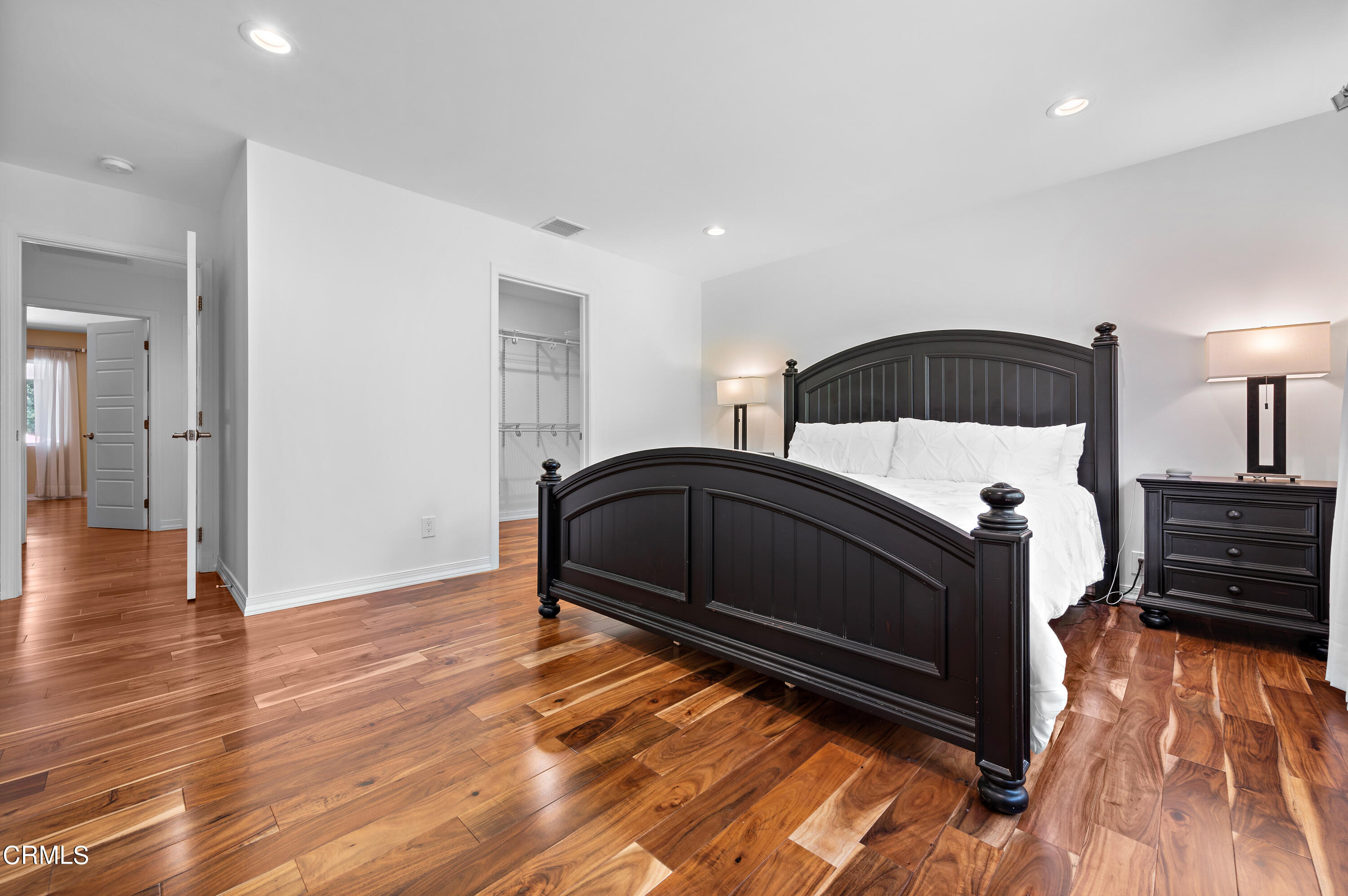 3770 Shadow Grove Road Pasadena, CA 91107 - Photo 25 of 61 a living room with a bed furniture and a wooden floor